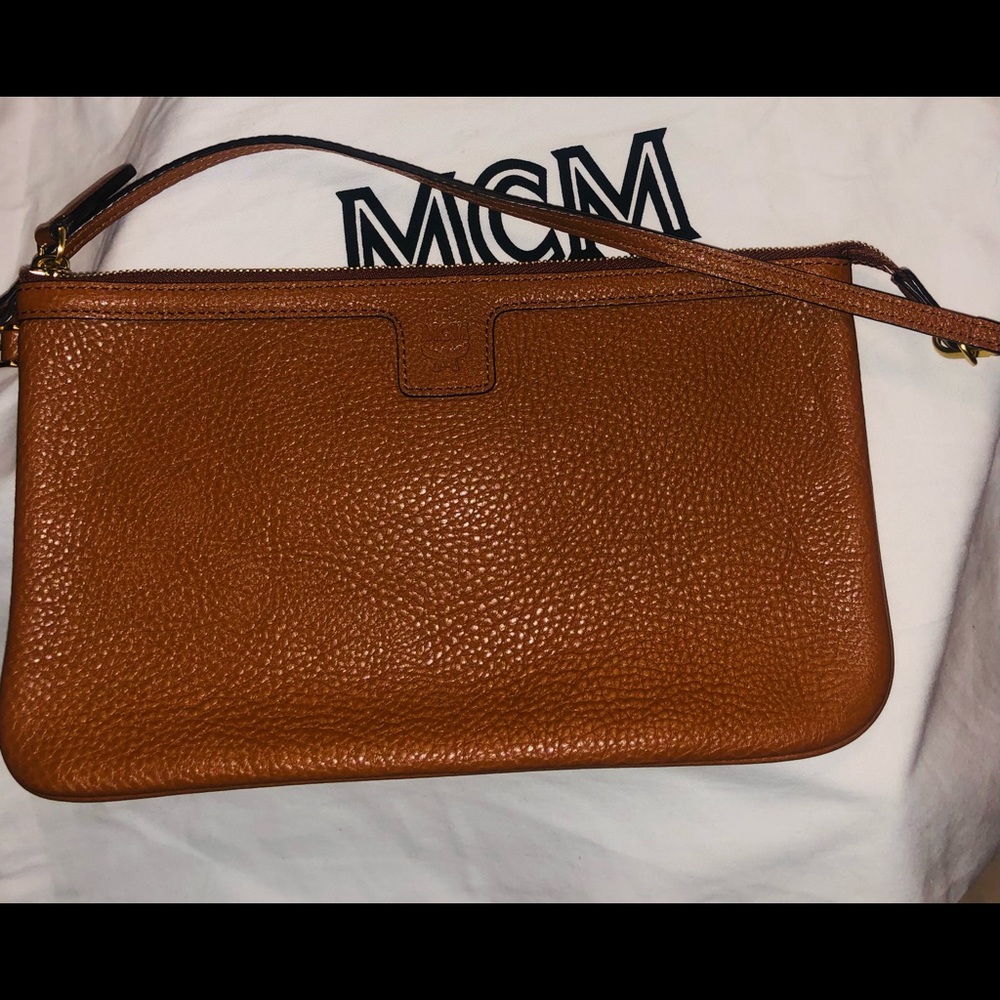 MCM caramel colored shoulder bag.